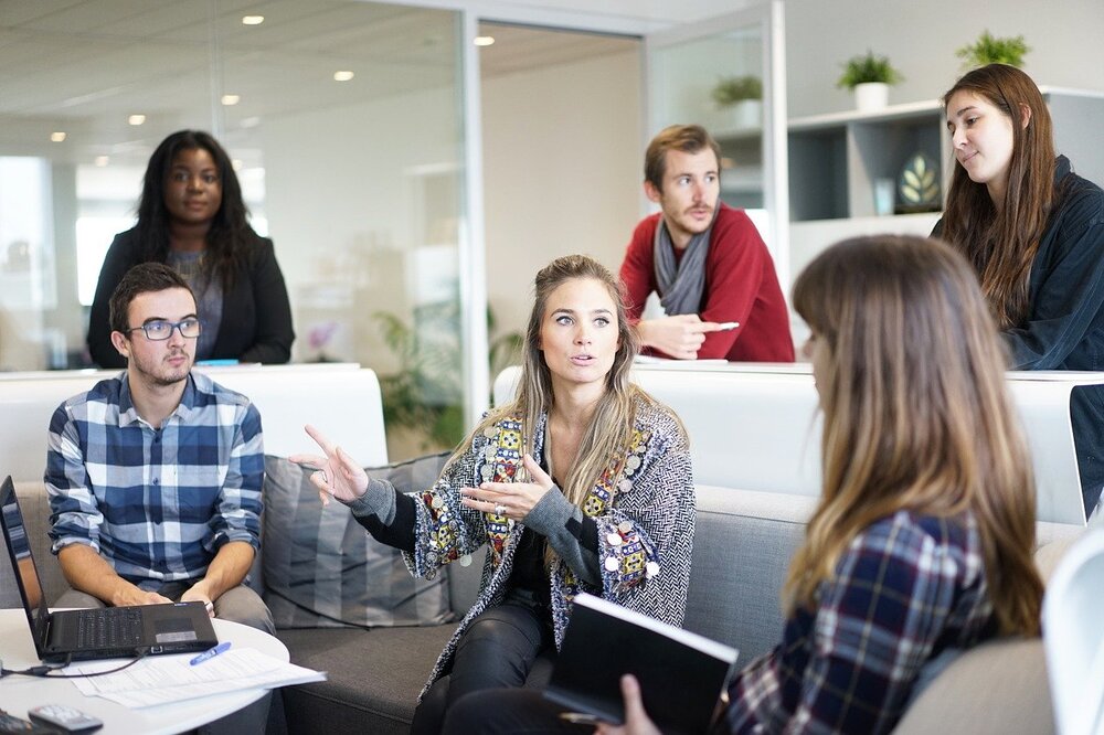 stock photo of people having a meeting